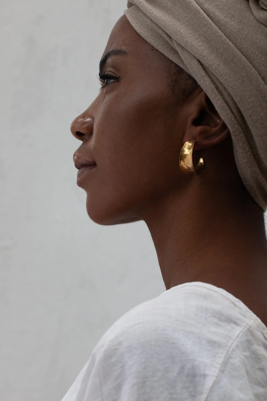 sustainably and ethically crafted golden hoops.